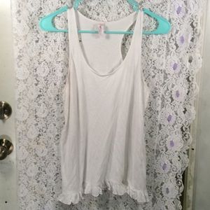 White tank with ruffle bottom